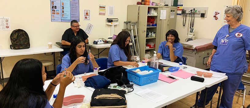 Healthcare Career College students in Paramount receiving practical training.