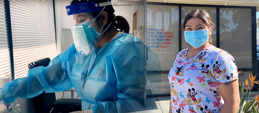 A photo of Ingrid practicing phlebotomy and a photo of her standing outside in scrubs.