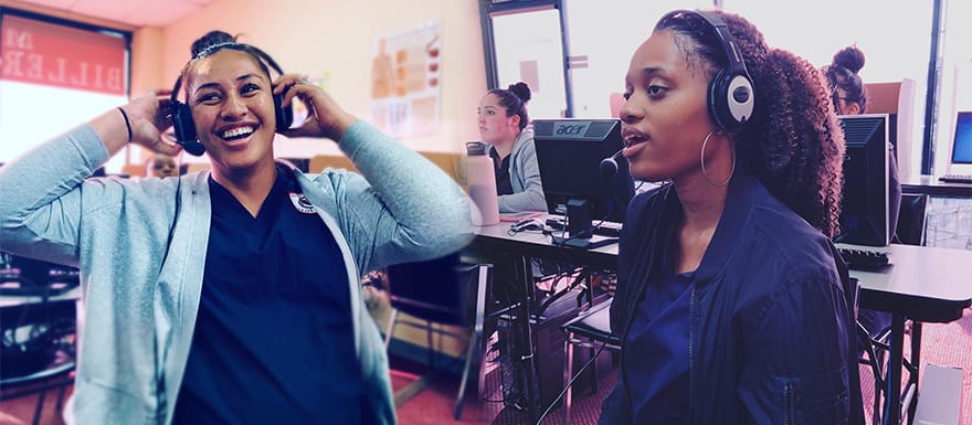 Students wearing headphones in a computer lab.